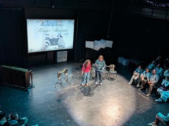 students on stage